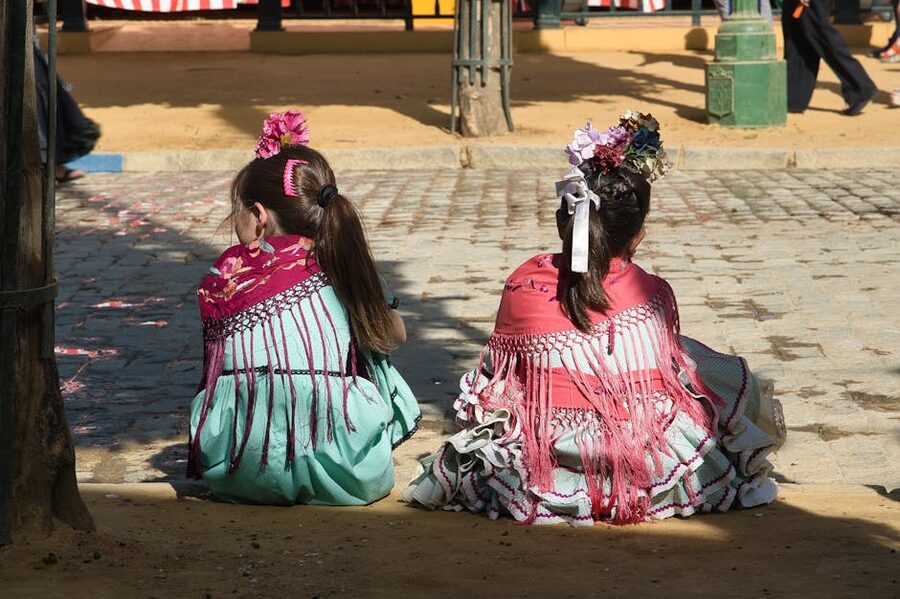 Girls in traditional flamenco dresses Sevilla festival