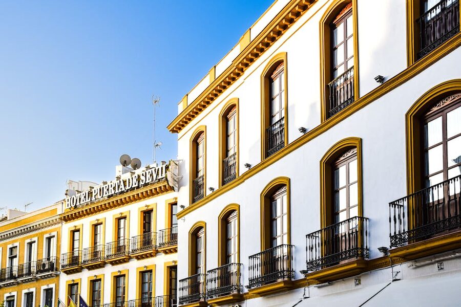 Seville building facade white walls sunlit