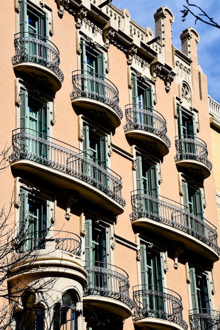 Ornate Art Nouveau architectural detail on a Spanish building