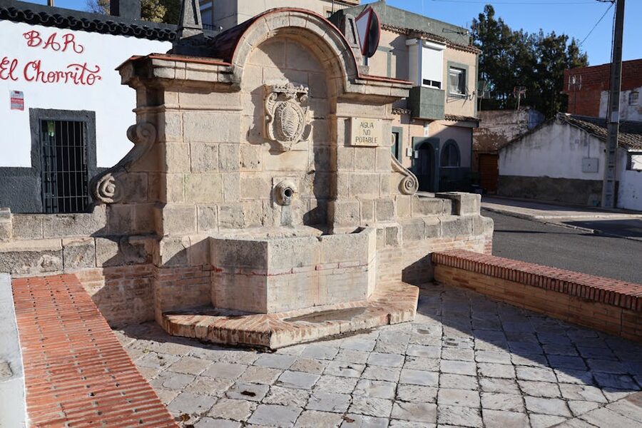Fountain in the centre of an old town plaza in Spain