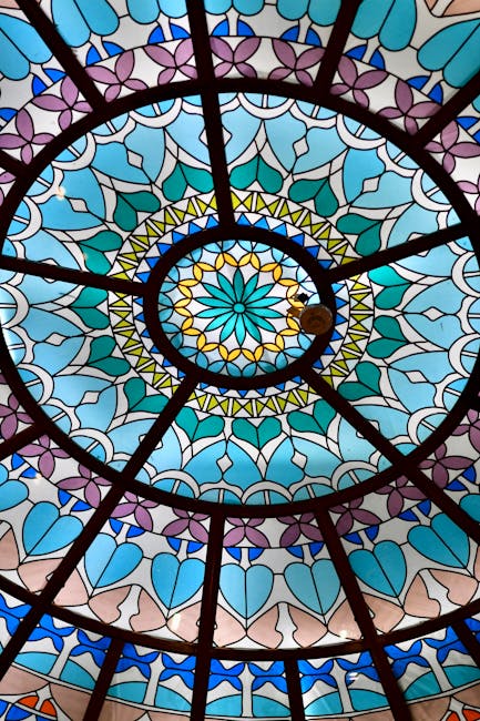 Colourful stained glass dome casting light into interior