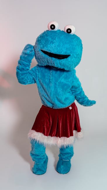 Costumed theme park character greeting children