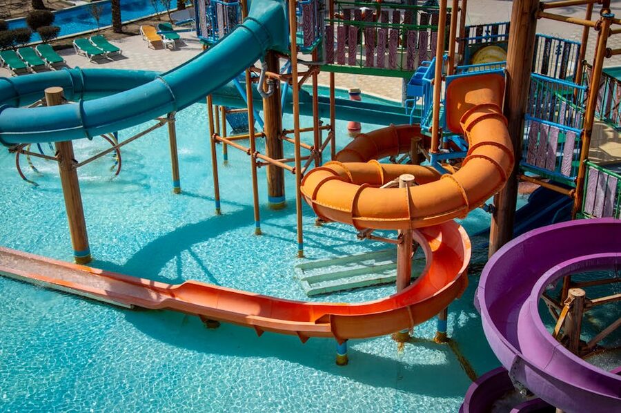Colorful water park slides on sunny day