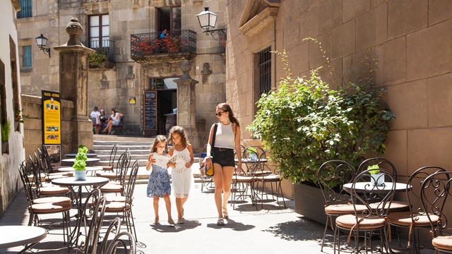 Children playing in the squares of Poble Espanyol Barcelona