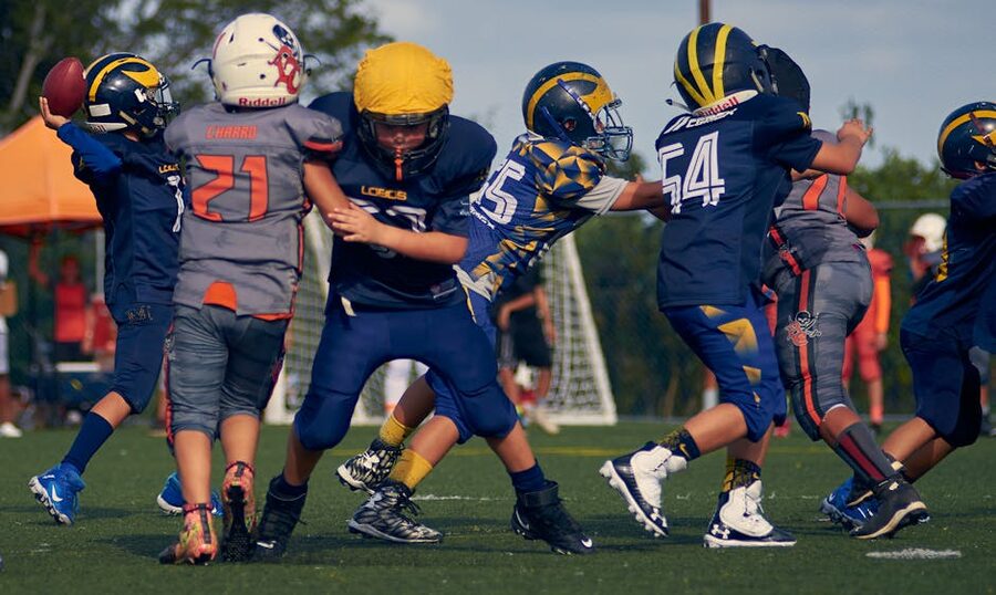 Young football players competing on the field